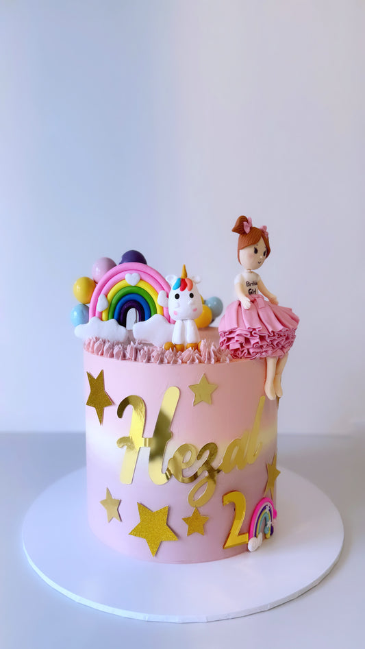 Whimsical Pink Birthday Cake with Rainbow &amp; Doll Topper