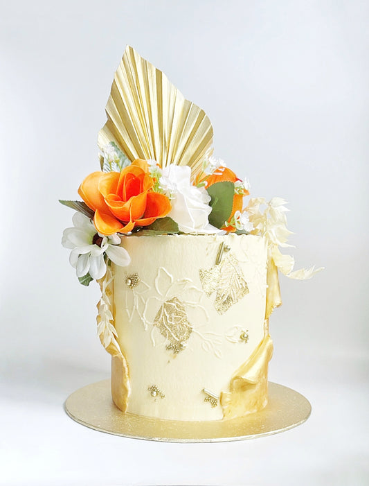 Luxurious Gold Wrap Birthday Cake with Florals
