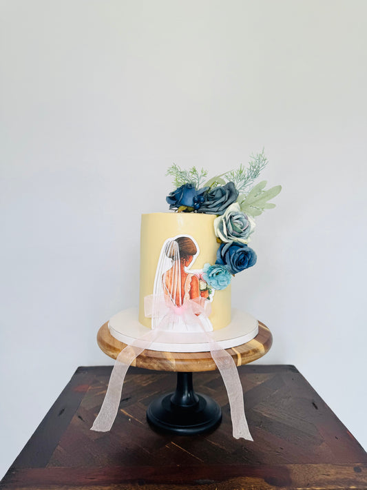 Elegant Bride-Themed Cake with Florals