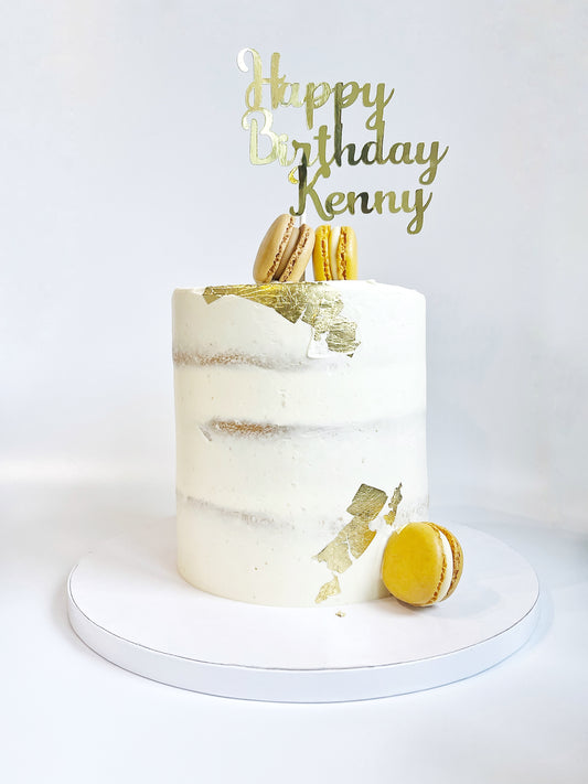 Elegant Gold & Macaron Cake – Custom Name Topper