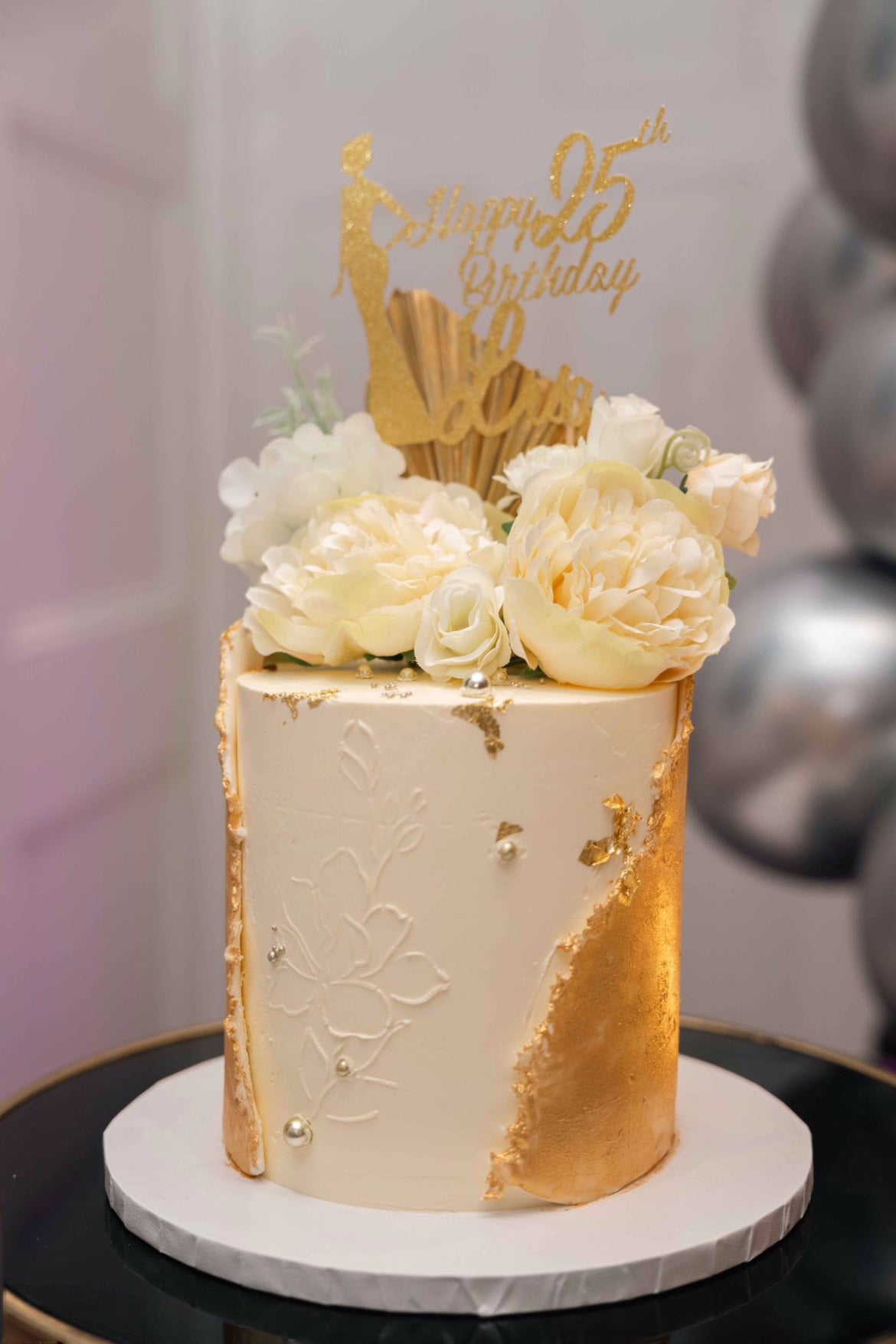 Luxurious Gold Wrap Birthday Cake with Florals